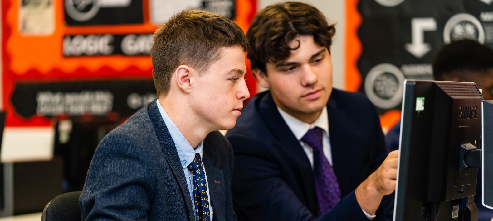 Two Embley Sixth Form students working at computer