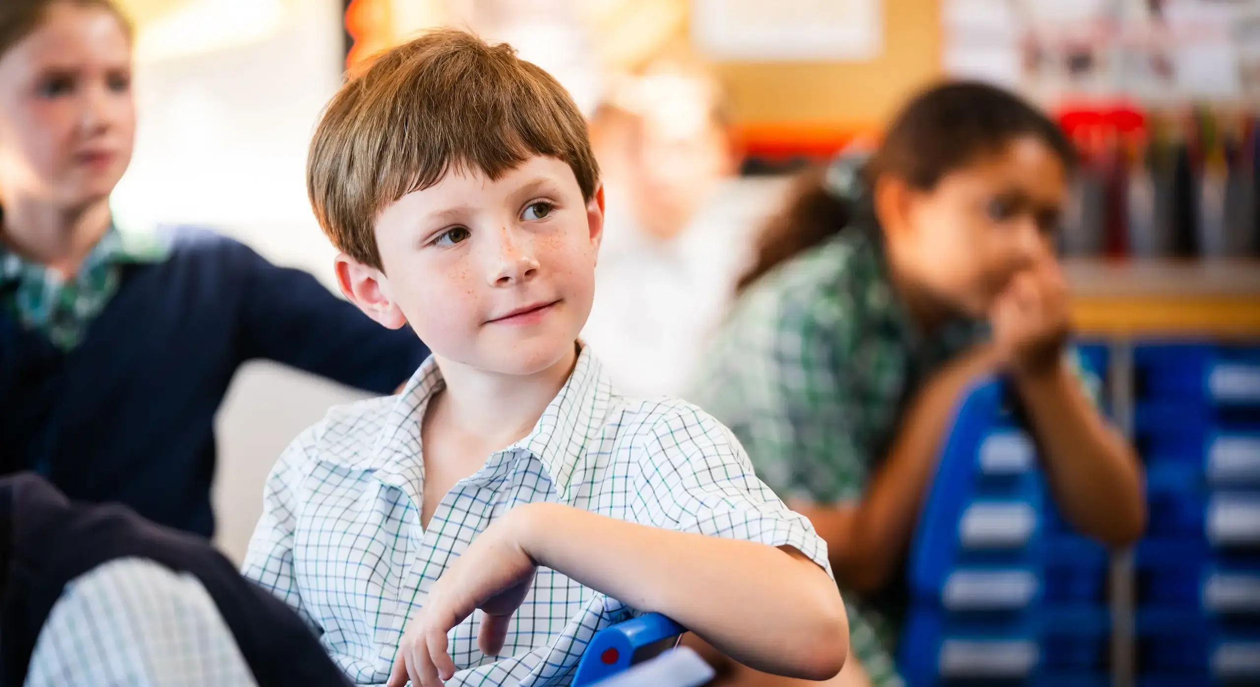 Embley prep pupil sitting in classroom