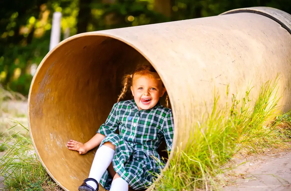 Embley Nursery pupil playing outside