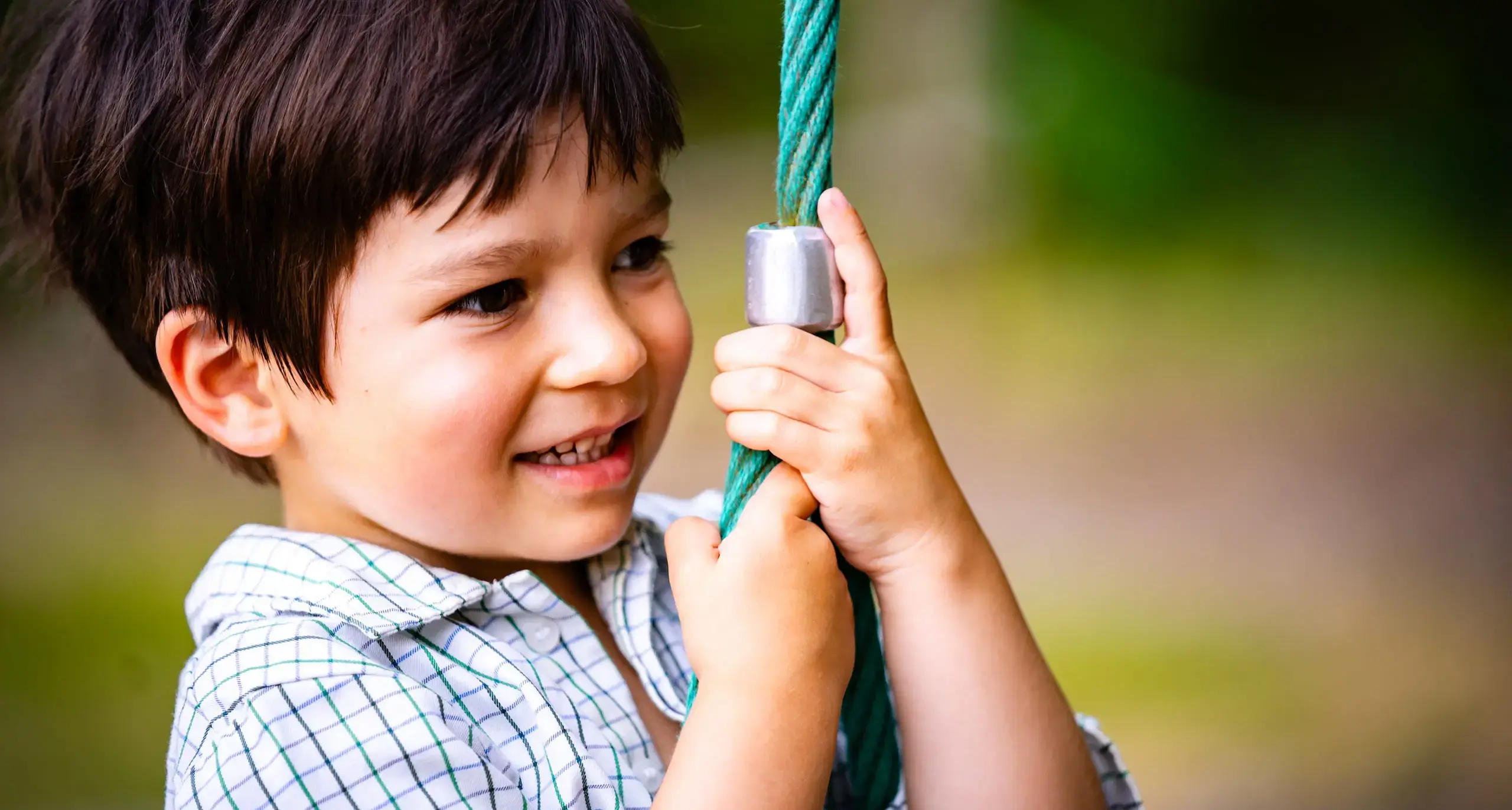 Embley Nursery pupil playing outside