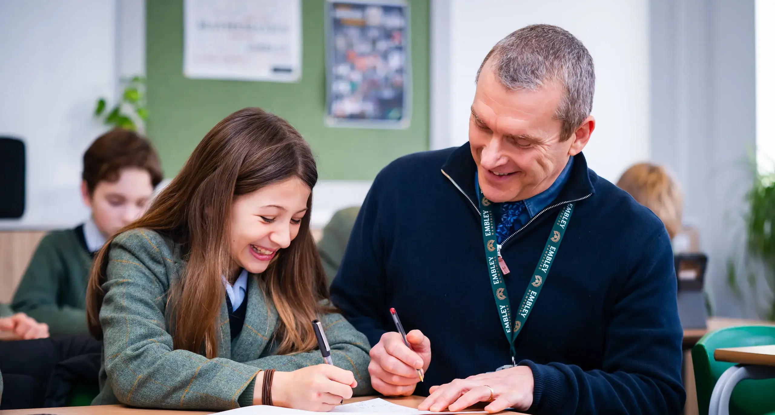 Embley pupil working with her teacher