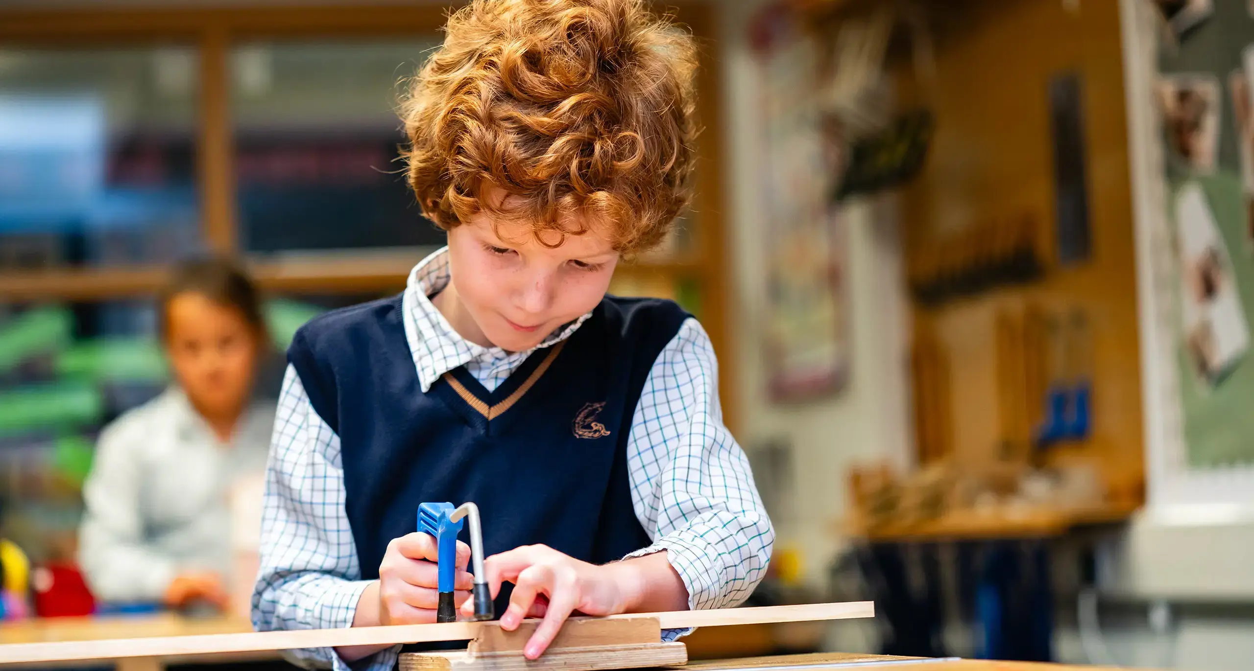 Student working on desk.