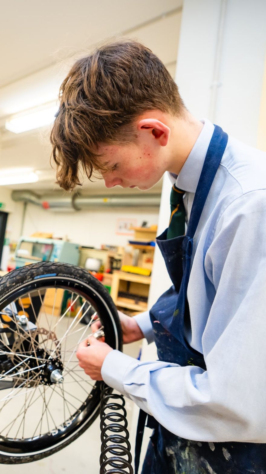 Embley pupil working on a wheel